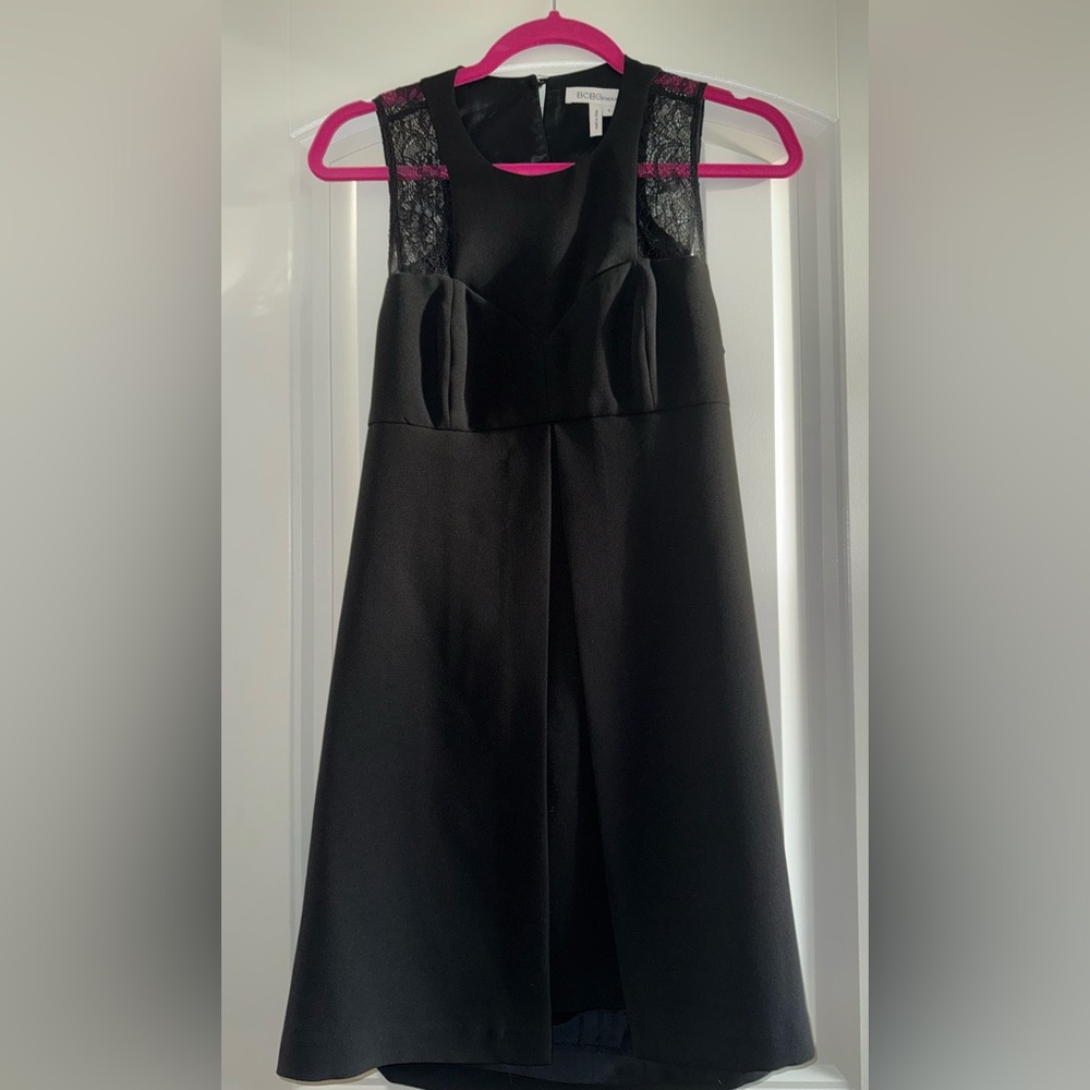 BCBGeneration Black Dress with cut out back and lace detail.